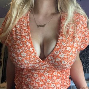 orange flower blouse
